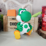 Action Figure Yoshi Baby Segurando Ovo 13 cm