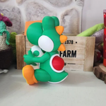 Action Figure Yoshi Baby Segurando Ovo 13 cm